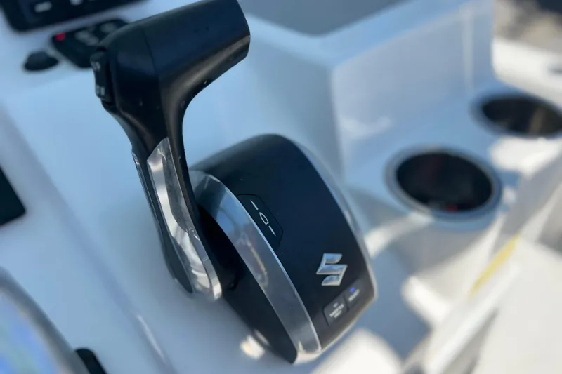Slide: The Image of Close-up of 2023 Sea Pro 248 Bay boat throttle control. - 30