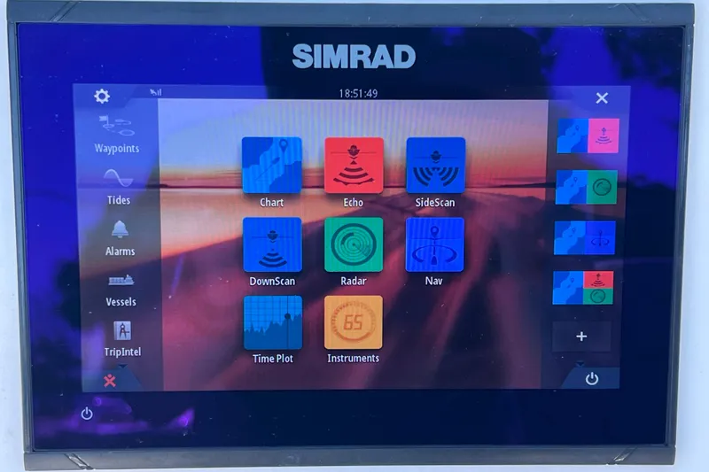 Slide: The Image of Simrad display on 2023 Sea Pro 248 Bay, showing navigation and sonar options. - 48