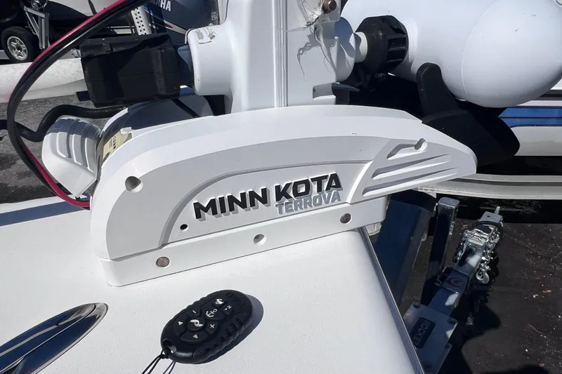 Slide: The Image of Minn Kota Terrova motor on 2023 Sea Pro 248 Bay boat, with remote control. - 53