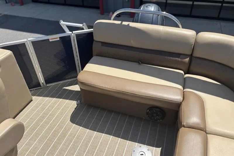 Slide: The Image of 2021 Godfrey Sweetwater 2086 C pontoon boat interior with beige seating and flooring. - 15