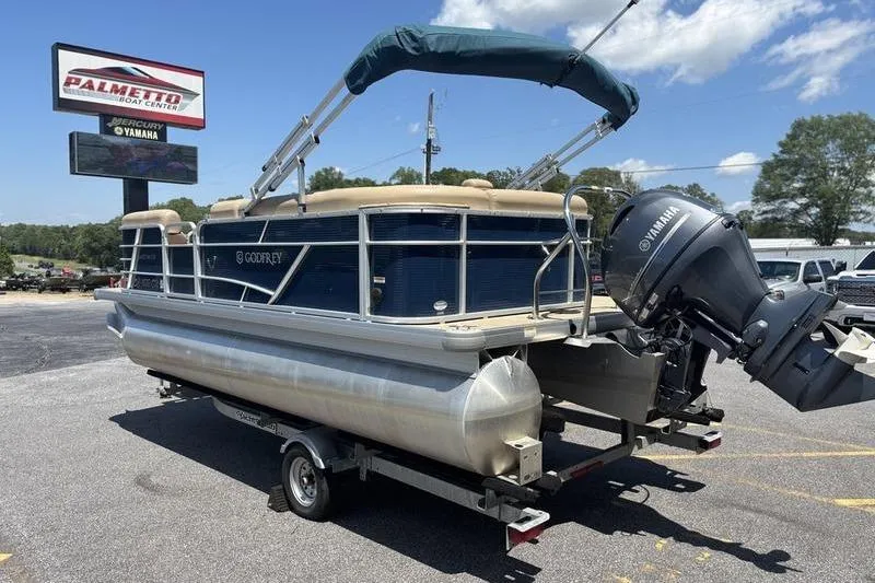 Slide: The Image of 2021 Godfrey Sweetwater 2086 C pontoon boat on trailer at dealership. - 4