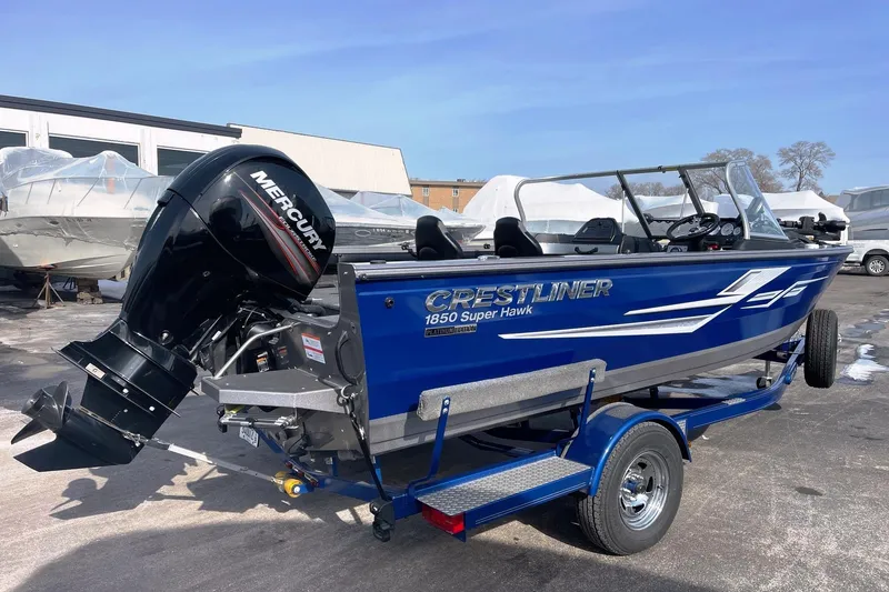 The Image of 2019 Crestliner 1850 Super Hawk boat with Mercury outboard motor on trailer. - 0