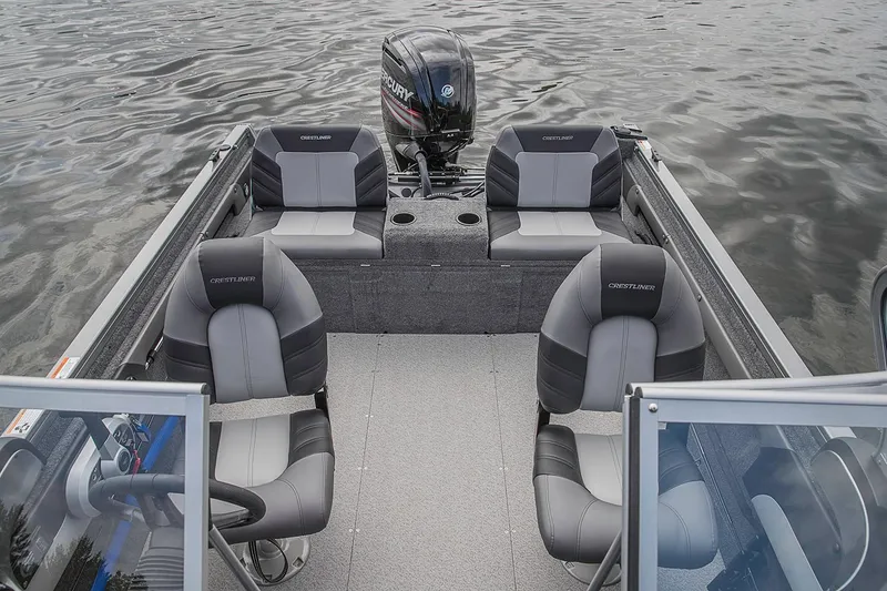Slide: The Image of Manufacturer Provided Image: 2019 Crestliner 1850 Super Hawk boat interior with seating and Mercury outboard motor. - 13