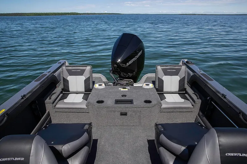 Slide: The Image of Manufacturer Provided Image: 2019 Crestliner 1850 Super Hawk boat interior on a lake. - 17