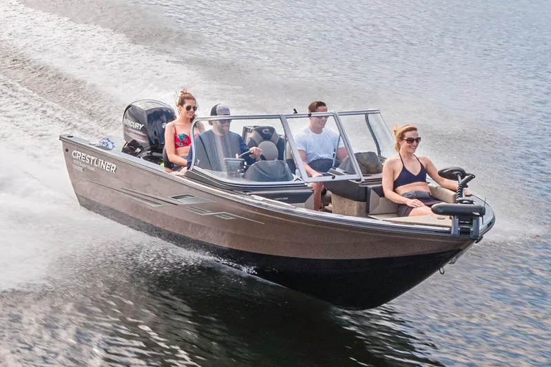 Slide: The Image of Manufacturer Provided Image: 2019 Crestliner 1850 Super Hawk boat cruising on water with passengers. - 6
