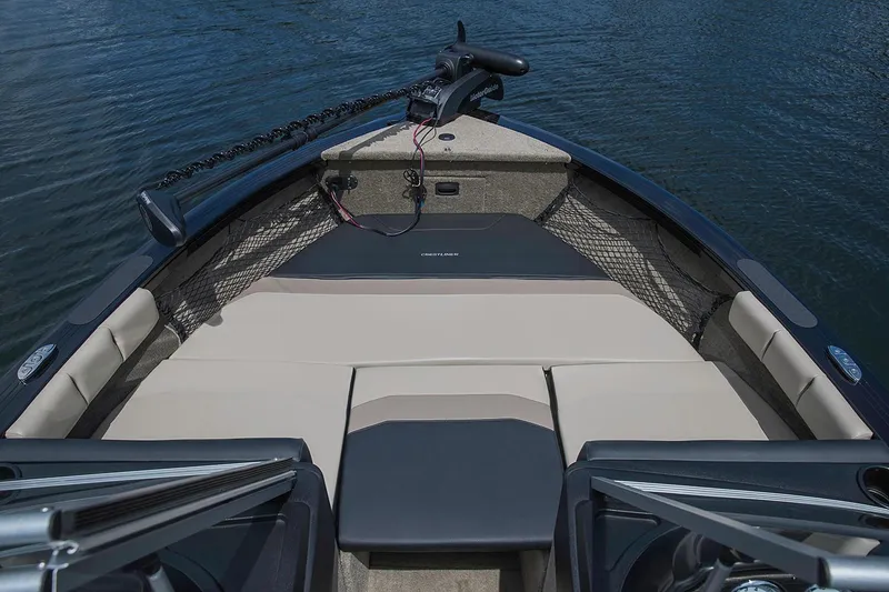 Slide: The Image of Manufacturer Provided Image: 2019 Crestliner 1850 Super Hawk boat interior with cushioned seating and trolling motor. - 8
