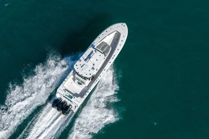 Slide: The Image of 2025 Front Runner 36 Center Console boat cruising on open water. - 3