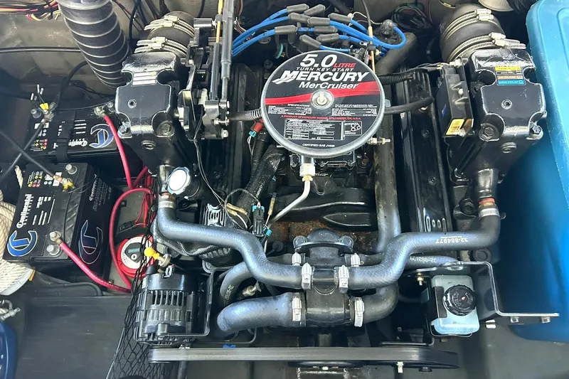 Slide: The Image of Engine compartment of a 2007 Glastron GT 205 with Mercury MerCruiser 5.0L engine. - 5