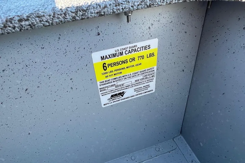 Slide: The Image of 2026 Lund SSV-16 boat capacity label, maximum 6 persons or 770 lbs. - 8