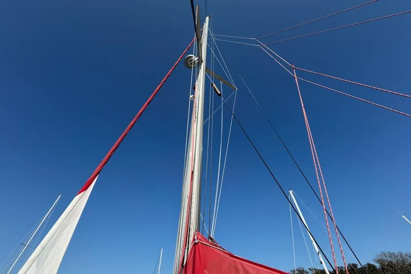 Slide: The Image of Sailboat mast and rigging against clear blue sky, Leopard 38, 2000 model. - 146