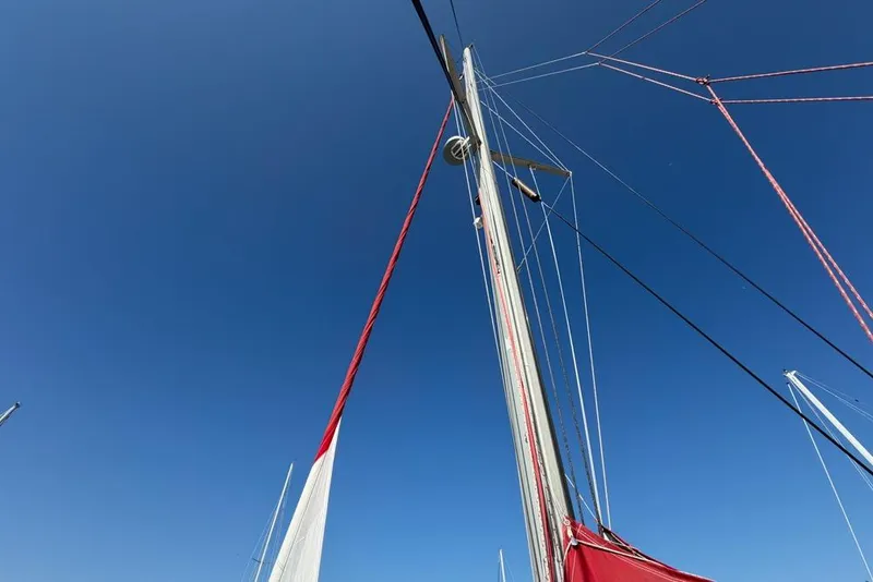 Slide: The Image of Sailboat mast and rigging against clear blue sky, Leopard 38, 2000 model. - 149