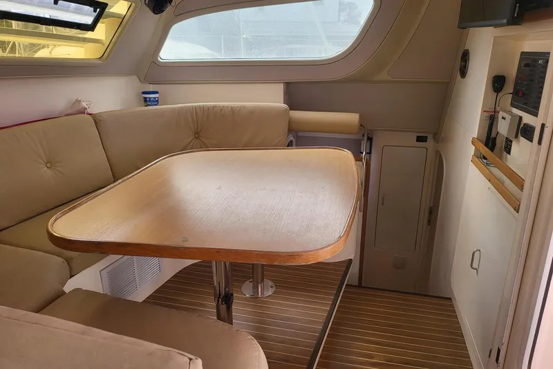 Slide: The Image of Blueprint of a 2000 Leopard 38 catamaran, showing side and top views. - 31