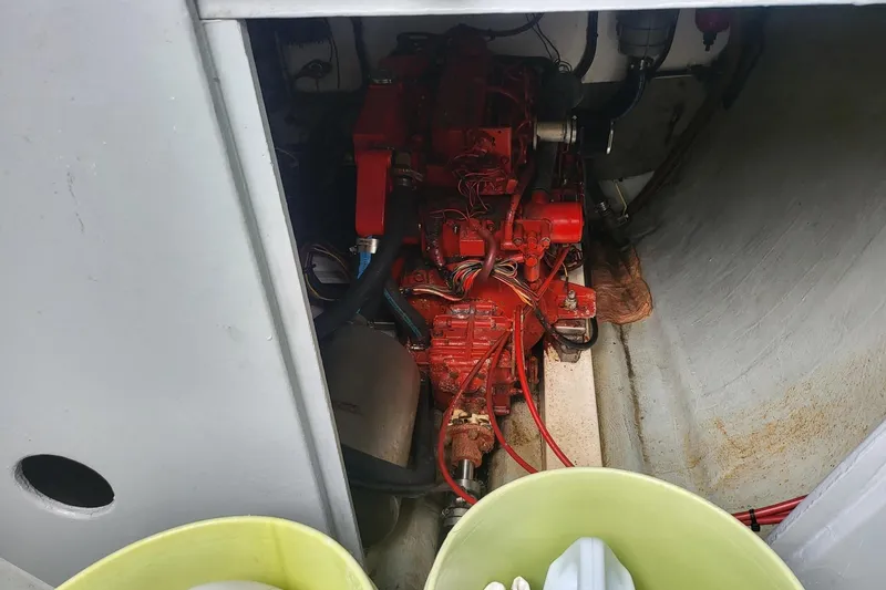 Slide: The Image of Interior view of a 2000 Leopard 38 yacht cockpit with steering wheel and seating. - 39