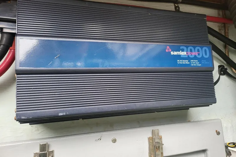 Slide: The Image of Interior view of a 2000 Leopard 38 catamaran at a marina dock. - 40