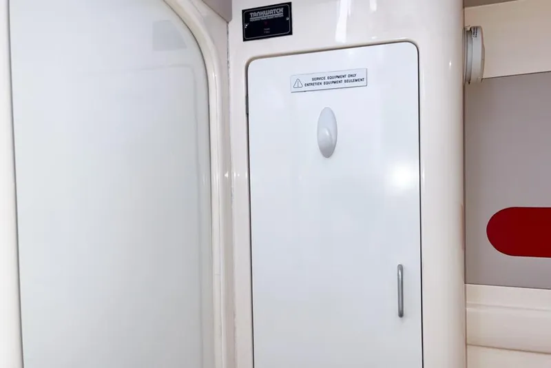 Slide: The Image of Interior of a 2000 Leopard 38 yacht showing a service equipment panel. - 69