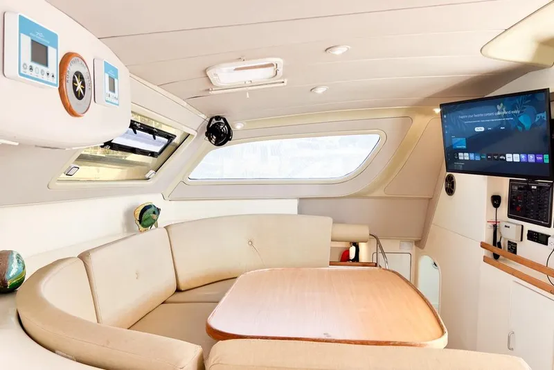 Slide: The Image of Interior of 2000 Leopard 38 yacht with cozy seating and modern amenities. - 78