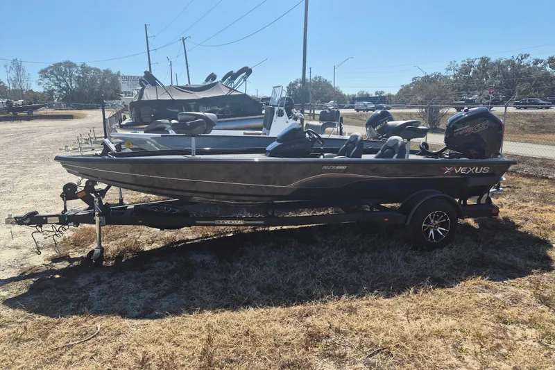 The Image of 2023 Vexus AVX1880 boat on trailer in outdoor setting. - 1