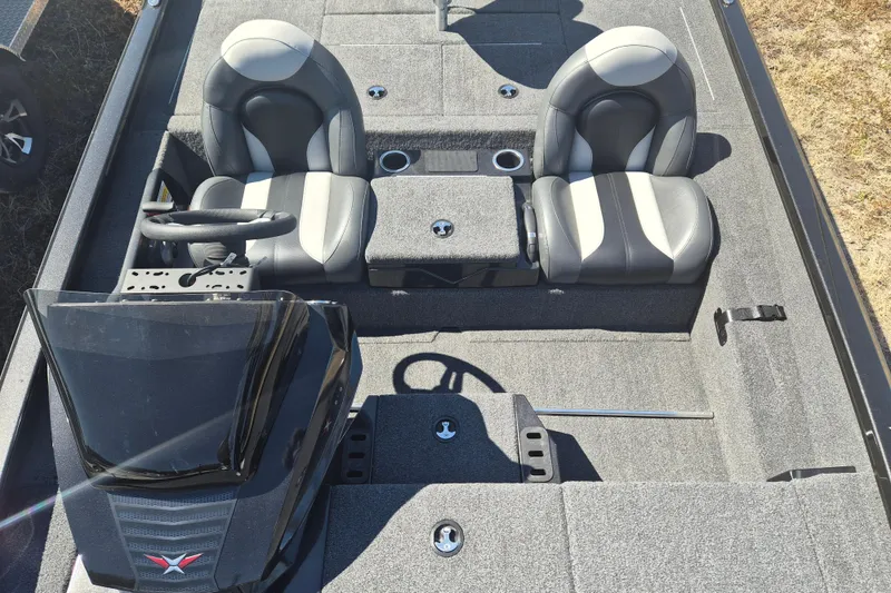 Slide: The Image of 2023 Vexus AVX1880 boat interior with dual seats and steering console. - 5