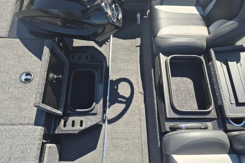 Slide: The Image of 2023 Vexus AVX1880 boat interior with storage compartments and seating. - 7