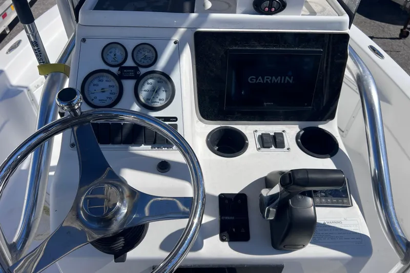 Slide: The Image of 2008 Skeeter ZX20 Bay boat dashboard with Garmin display and steering wheel. - 17