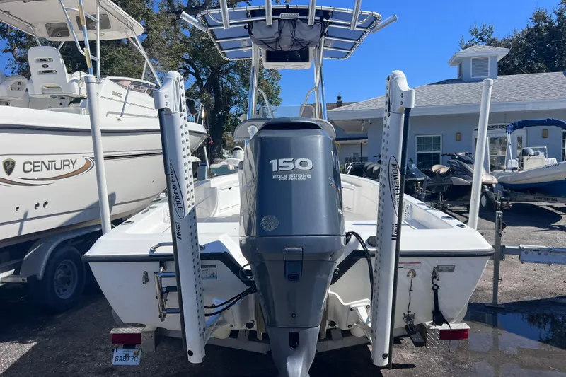 Slide: The Image of 2008 Skeeter ZX20 Bay boat with 150 horsepower engine, parked outdoors. - 2