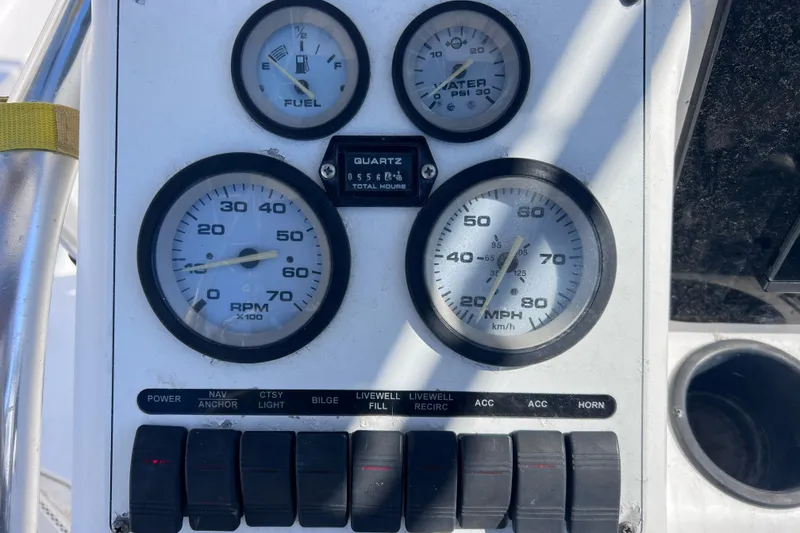 Slide: The Image of Instrument panel of a 2008 Skeeter ZX20 Bay boat with gauges and switches. - 21