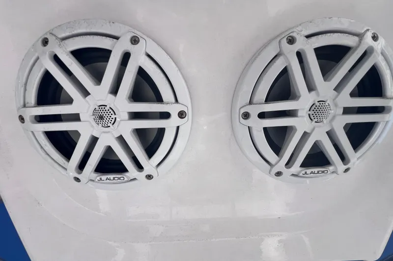 Slide: The Image of JL Audio speakers on a 2008 Skeeter ZX20 Bay boat, white grille design. - 26