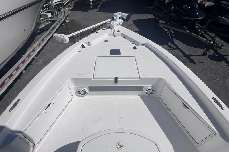 Slide: The Image of 2008 Skeeter ZX20 Bay boat deck with storage compartments and speakers. - 27