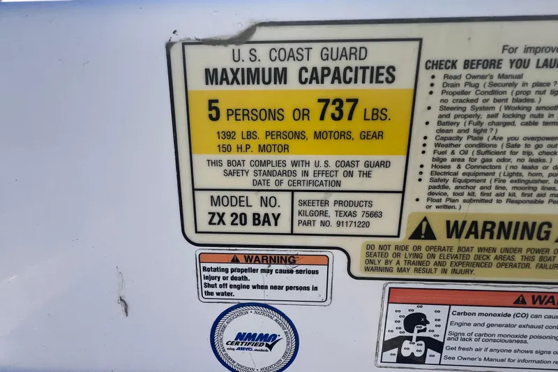 Slide: The Image of 2008 Skeeter ZX20 Bay boat capacity label, U.S. Coast Guard standards, 5 persons or 737 lbs. - 28