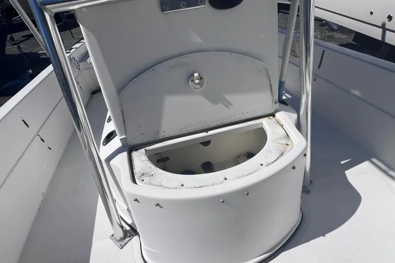 Slide: The Image of 2008 Skeeter ZX20 Bay boat with open storage compartment on deck. - 31
