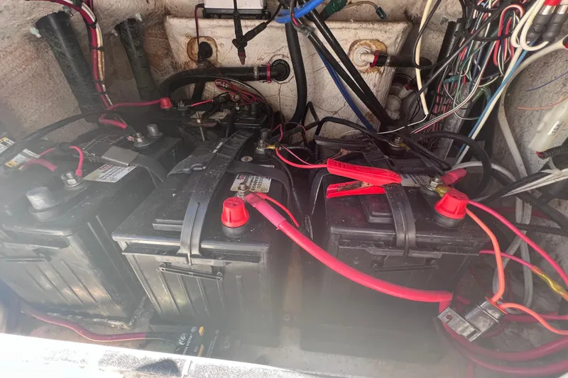 Slide: The Image of Battery compartment of a 2008 Skeeter ZX20 Bay boat with wiring connections. - 38