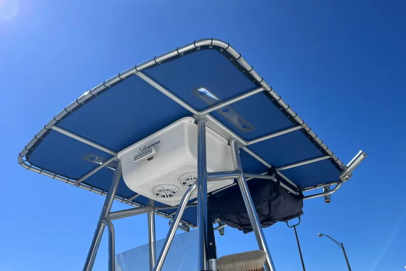 Slide: The Image of 2008 Skeeter ZX20 Bay boat T-top against clear blue sky. - 8