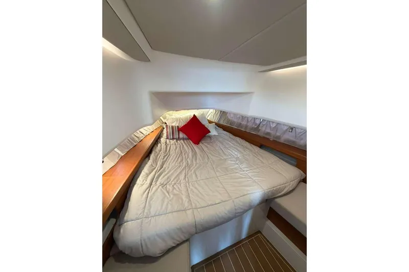 Slide: The Image of Compact bathroom in 2021 Nimbus T-11 boat with sink, shower, and mirror. - 13