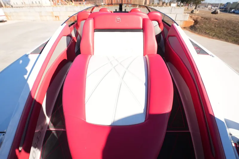 Slide: The Image of 2019 Mystic Powerboats C3800 with red and white seating, showcasing luxury design. - 17