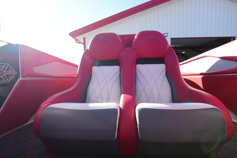 Slide: The Image of 2019 Mystic Powerboats C3800 interior with red and white luxury seating. - 34