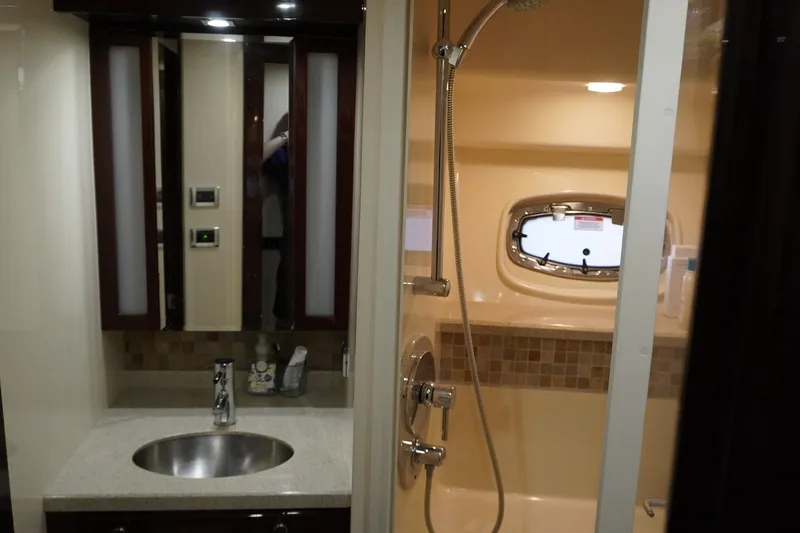 Slide: The Image of Luxurious bathroom interior of 2009 Sea Ray 47 Sedan Bridge yacht with modern fixtures. - 39