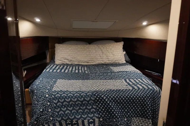 Slide: The Image of Luxurious bedroom interior of 2009 Sea Ray 47 Sedan Bridge yacht. - 45