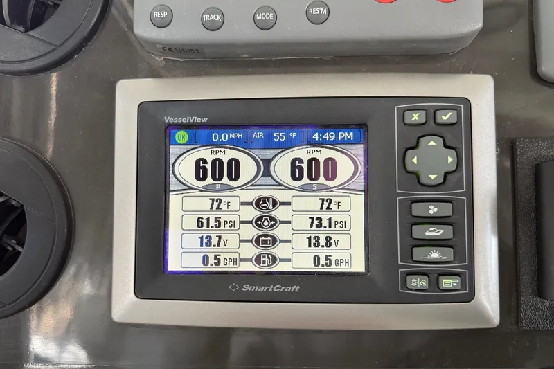 Slide: The Image of SmartCraft VesselView display on 2009 Sea Ray 47 Sedan Bridge showing engine metrics. - 55
