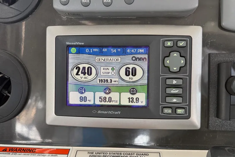 Slide: The Image of SmartCraft VesselView display on 2009 Sea Ray 47 Sedan Bridge showing generator stats. - 57