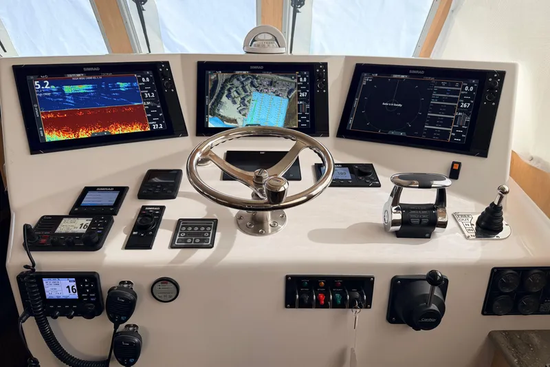 Slide: The Image of Stainless steel winch on 2025 Wesmac 42 boat deck, with Nordic branding. - 12