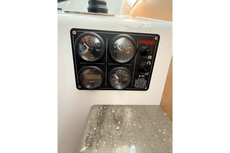 Slide: The Image of Modern kitchen in 2025 Wesmac 42 boat with appliances and wooden cabinetry. - 29