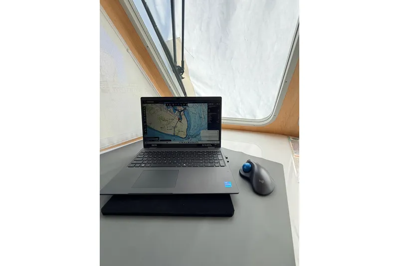 Slide: The Image of Control panel of a 2025 Wesmac 42 boat, featuring gauges and switches. - 32