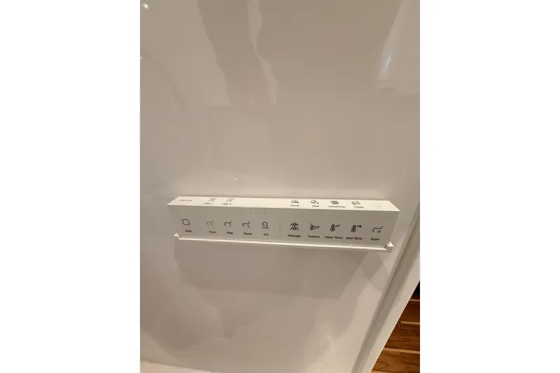 Slide: The Image of Electrical panel of 2025 Wesmac 42 boat, featuring multiple switches and controls. - 37