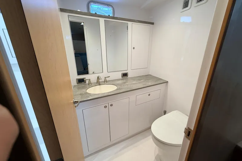 Slide: The Image of Modern bathroom in 2025 Wesmac 42 yacht with sleek fixtures and ample storage. - 38