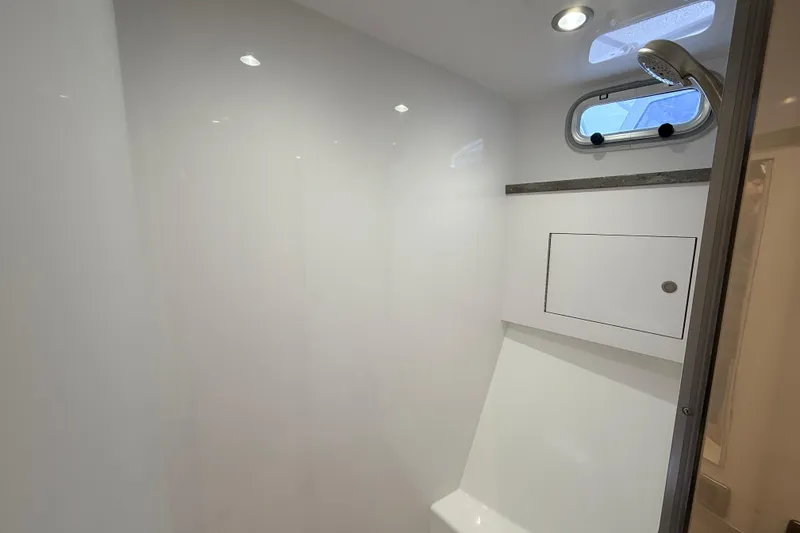 Slide: The Image of Modern toilet with control panel in 2025 Wesmac 42 yacht bathroom. - 39