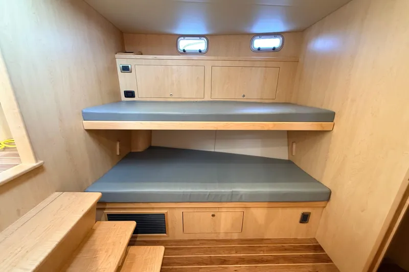 Slide: The Image of Modern bathroom in 2025 Wesmac 42 yacht with sleek vanity and mirror. - 41