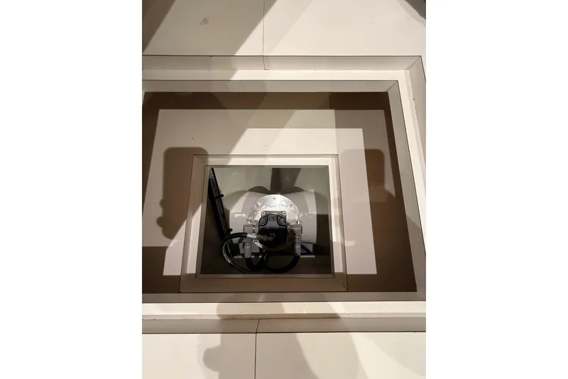 Slide: The Image of Control panel inside 2025 Wesmac 42 boat, featuring switches and indicators. - 57