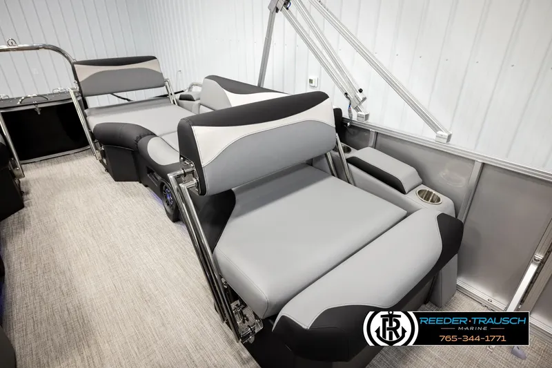 Slide: The Image of 2026 Avalon LSZ QLS boat interior with luxurious gray seating and cup holders. - 22