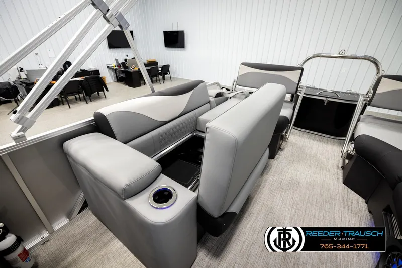 Slide: The Image of Luxurious interior of 2026 Avalon LSZ QLS pontoon boat with modern seating and cup holders. - 29