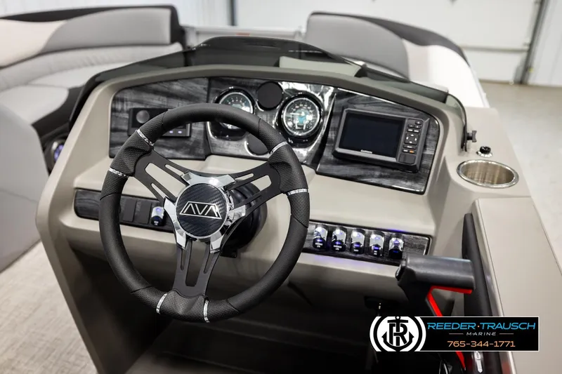 Slide: The Image of 2026 Avalon LSZ QLS boat dashboard with steering wheel and control panel. - 31